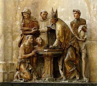 Baptism of Augustine of Hippo as represented in a sculptural group in Troyes Cathedral, 1549, Troyes, France.